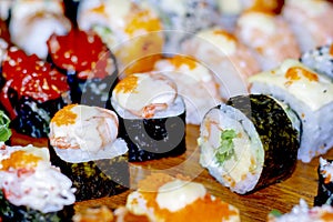 Sushi close-up on wooden background, Japanese food.