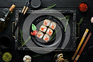 Sushi with crab and caviar cooked in oil. Sushi menu of Japanese restaurant.