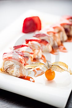 Sushi dessert manilla maki with strawberries photo