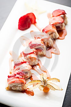 Sushi dessert manilla maki with strawberries photo