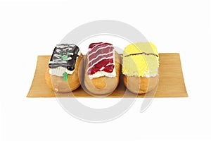 Sushi Donuts in the bamboo dish on white background.