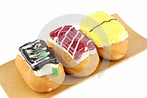 Sushi Donuts in the bamboo dish on white background.