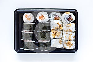 Sushi maki and crispy rolls on the plate