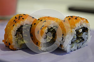 Sushi makis with masago photo