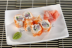 Sushi menu rolls with flying fish caviar