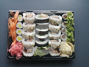 Sushi mix Japanese dish in plastic packaging