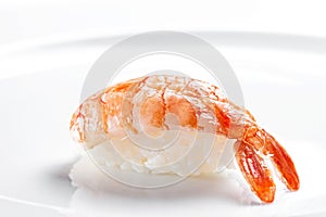 Sushi nigiri with tiger shrimp on a white background