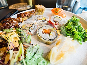 Sushi platter with maki, nigiri and wakame