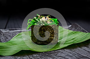 Sushi roll gunkan with chuka seaweed