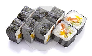 Sushi roll in nori with salmon cheese and vegetables isolated