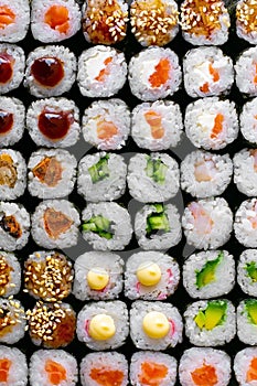 Sushi roll pattern. Traditional japanese food. A lot of maki. Sushi rolls