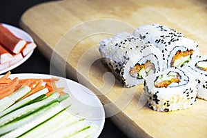 Sushi roll preparing