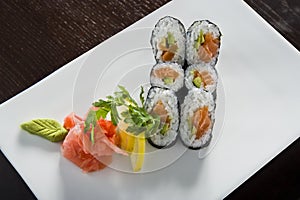 Sushi roll with salmon and shrimp tempura