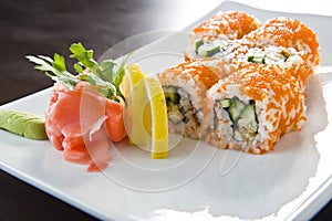 Sushi roll with salmon and shrimp tempura