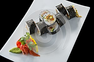 Sushi roll with salmon and shrimp tempura