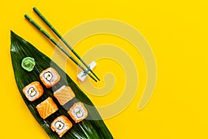 Sushi roll set eco served on green Bamboo leave, top view