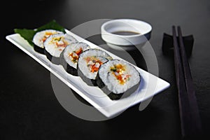 Sushi roll set serving on white plate