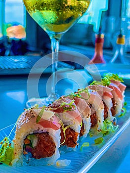 sushi roll and wine