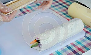 Sushi rolled onwhite plate photo