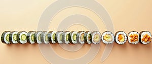 Sushi Rolls Arranged in a Vertical Gradient Transitioning from Light Cucumber Rolls to Dark Eel Rolls
