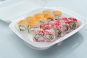 sushi rolls in lunchboxes, philadelphia and california