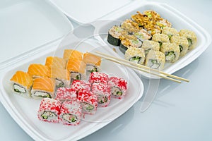 sushi rolls in lunchboxes, philadelphia and california