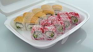 sushi rolls in lunchboxes, philadelphia and california