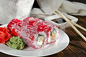 Sushi rolls in masago caviar