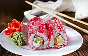 Sushi rolls in masago caviar