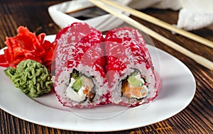 Sushi rolls in masago caviar