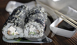 Sushi rolls in masago caviar