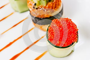 Sushi rolls on plate, gourmet seafood delicatessen