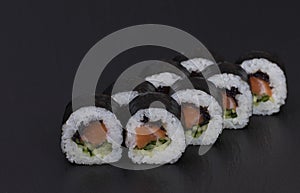 Sushi Rolls Sake Kappa Maki with RICE, SALMON, CUCUMBER and MASAGO