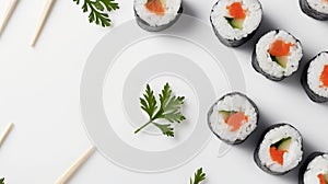 Sushi rolls with salmon and cucumber garnished with parsley, arranged neatly with chopsticks on a white surface