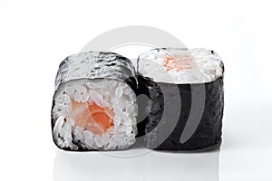 Sushi rolls with salmon on a white background