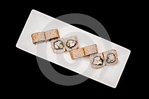 Sushi and rolls set on black background