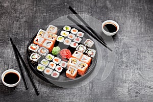 Sushi rolls set served in round plate