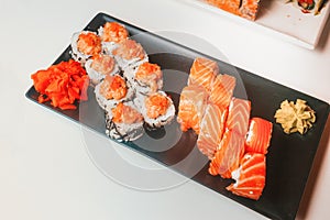 Sushi rolls set served on white plate