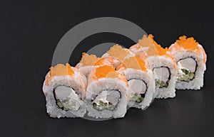 Sushi Rolls Suri Ebi Maki with RICE, TIGER SHRIMPS, CRAB STICKS, CREAM CHEESE, CUCUMBERS and MASAGO