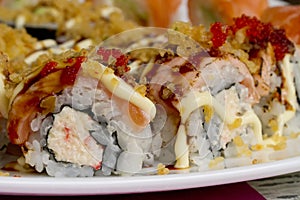 Sushi rolls with vassabi on the plate