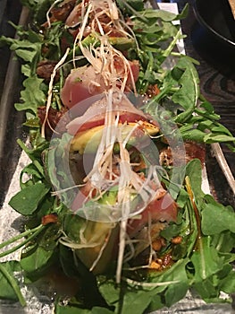 Sushi with salad and avocado