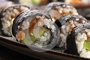 Sushi - Salmon rolls served on a plate