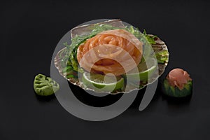 Sushi seaweed and salmon salad over shell