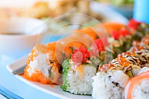 Sushi is served on a dish. Ready for eating