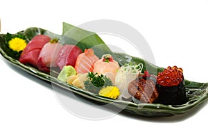 Sushi Set assorted nigiri platter on plate white background selective focus point