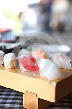 Sushi Set nigiri and sushi maki with tea served on wood and soup , Japanese food