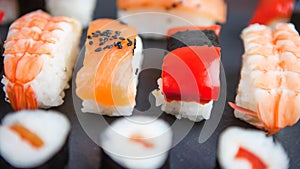 Sushi set panorama with copy space. An assortment of various maki, nigiri and rolls