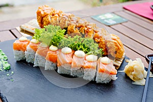 Sushi set roll california shrimp. Japanese traditional fusion cuisine. Delivery food on qurantine. Rice, nori, tiger
