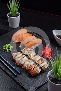 Sushi Set sashimi and sushi rolls served photo