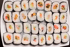 Big sushi set on the white plate